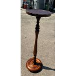 Vintage mahogany plant stand measures approx 40 inches tall by 12 inches diameter