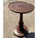 Antique mahogany plant stand measures approx 29.5 inches tall by 19 inches diameter