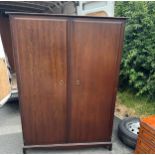 Mahogany stagg wardrobe measures approximately 69inches tall 48 inches wide 22 inches depth