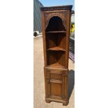 Vintage oak two piece corner cupboard measures approx 66 inches tall by 10 inches deep
