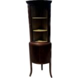 Mahogany corner cabinet with bow front glass measures approx 67.5 inches tall