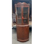 Mahogany 4 door corner unit measures approximately 68 inches tall 17 inches depth