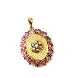 Antique vintage 14ct gold pendant set with seed pearls and pink stones marked 585 weighs approx 4