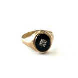 9ct gold signet ring with black onyx set with small diamond weighs approx 4 grams and UK size U