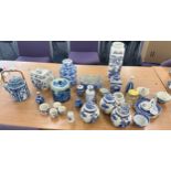 Large selection of blue and white pottery includes Masons, Wade, Victorian ironstones biscuit jar