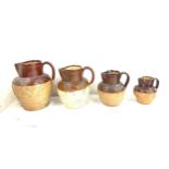 Selection of 4 antique Lambeth stoneware jugs includes 1 marked Doulton