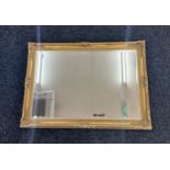 Large gilt framed mirror measures approx 42 inches tall by 20 inches wide