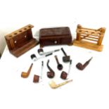 Selection of smoking pipes and pipe racks