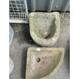 Two concrete antique water feeders