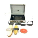 Vintage horse stirrups and grooming brushes etc