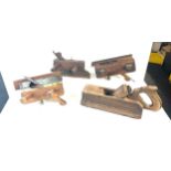 Selection of vintage wood tools includes planes etc