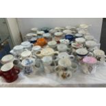 A large collection of porcelain shaving mugs various makers and designs