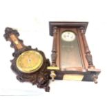 Antiqued carved barometer and a 2 key hole wall clock