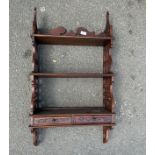 Mahogany two drawer two shelves carved wall hanging book case measures approx 37 inches tall by 19.5