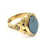 18ct gold hallmarked gents stone set signet ring, light blue stone has sustained damage, detailed