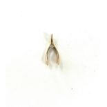 Vintage 9ct gold charm wishbone weighs approx 1.9 gm
