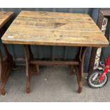Wood and metal industrial table measures approx 32 inches tall by 32 inches wide and 28 inches deep