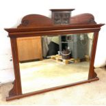 Mahogany over mantle mirror measures approximately 52 inches wide 41 inches tall