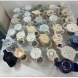 A large collection of porcelain shaving mugs various makers and designs