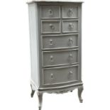 4 over 3, 7 drawer painted chest measures approximately 48 inches tall 19 inches depth 24 inches
