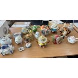 Large selection of novelty tea pots includes London town Christopher Wren tea pot, donkey, fish,