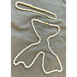 Two vintage pearl necklaces with 9ct gold clasp