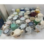 A large collection of porcelain shaving mugs various makers and designs