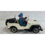 T.N Nomura, Police Patrol Jeep, tin toys, Japan 1950s mechanical