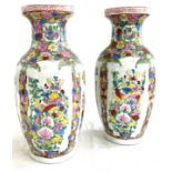 Pair of oriental vases possibly chinese height approximately 31 cm