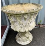 Large concrete urn measures approx 24 inches tall