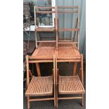 Teak garden table with four folding chairs measures approx 36 inches by 36 inches by 29 inches high