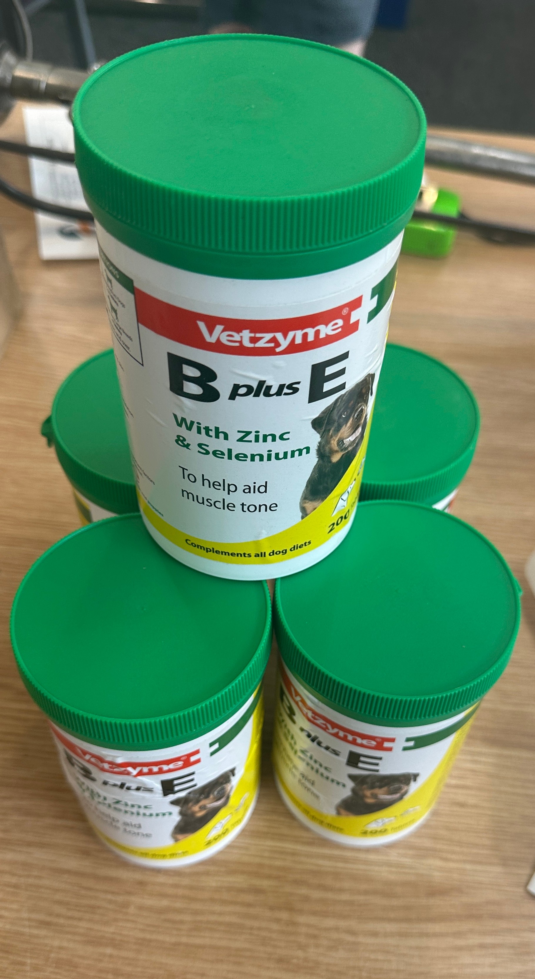 Five jars of Vetzyme bplusE dog vitamin tablets, 200 tablets in each jar