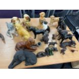 Large selection of assorted dog figures includes small bust, pair of dogs etc