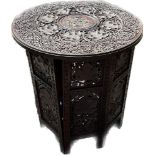 Indonesian bone inlaid wooden folding table, approximate measurements Diameter 21 inches, Height