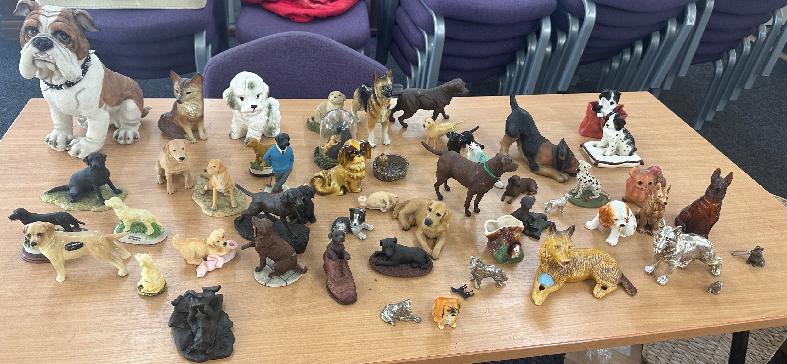 Large selection of assorted dog figures