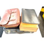 Selection of vintage and later suitcases and brief cases