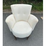 Upholstered bedroom chair with queen Anne legs