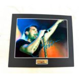 Signed photo of Robbie Williams