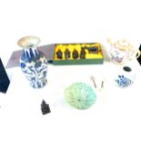 Selection of oriental items includes blue and white vase, small metal foo dog figure etc