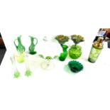 Large selection of green art glass includes vases