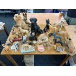 Large selection of assorted dog figures includes chalk, porcelain etc