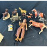 Selection of vintage toys includes Cowboy figure, horses etc