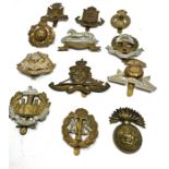 12 military cap badges inc lancashire fusiliers -essex reg .york etc