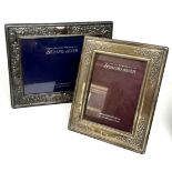 2 silver picture frames largest measure approx 22cm by 17cm