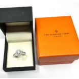 18ct white gold diamond halo & diamond shoulders with central moissanite ring in the original box by