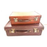 Two vintage leather briefcases largest measures approx 16 inches wide by 5.5 inches tall