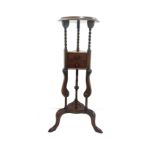 Mahogany 2 drawer plant stand measures approximately 34 inches tall
