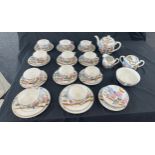 Oriental hand painted tea service with marks to base to include 11 cups complete cups and saucers,
