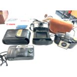 Selection of vintage cameras to include a Kodak brownie 127 camera, vintage Kodak 155x Instamatic