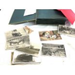 Vintage post card album with a large selection of assorted postcards